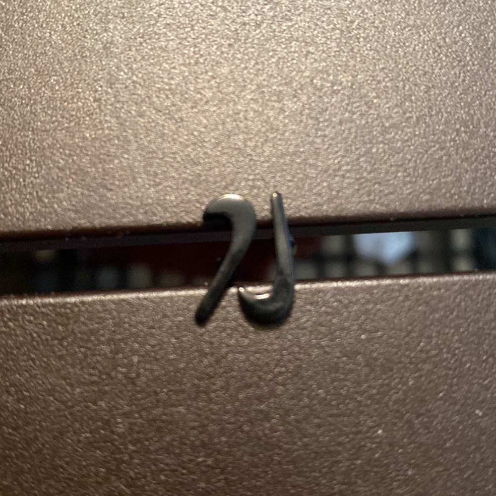 Nike swoosh earrings